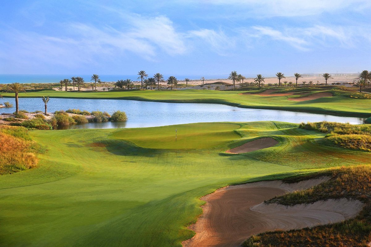Hudayriyat Golf Estates — golf course with Abu Dhabi skyline